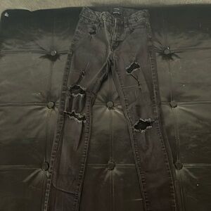 Black distressed skinny jeans